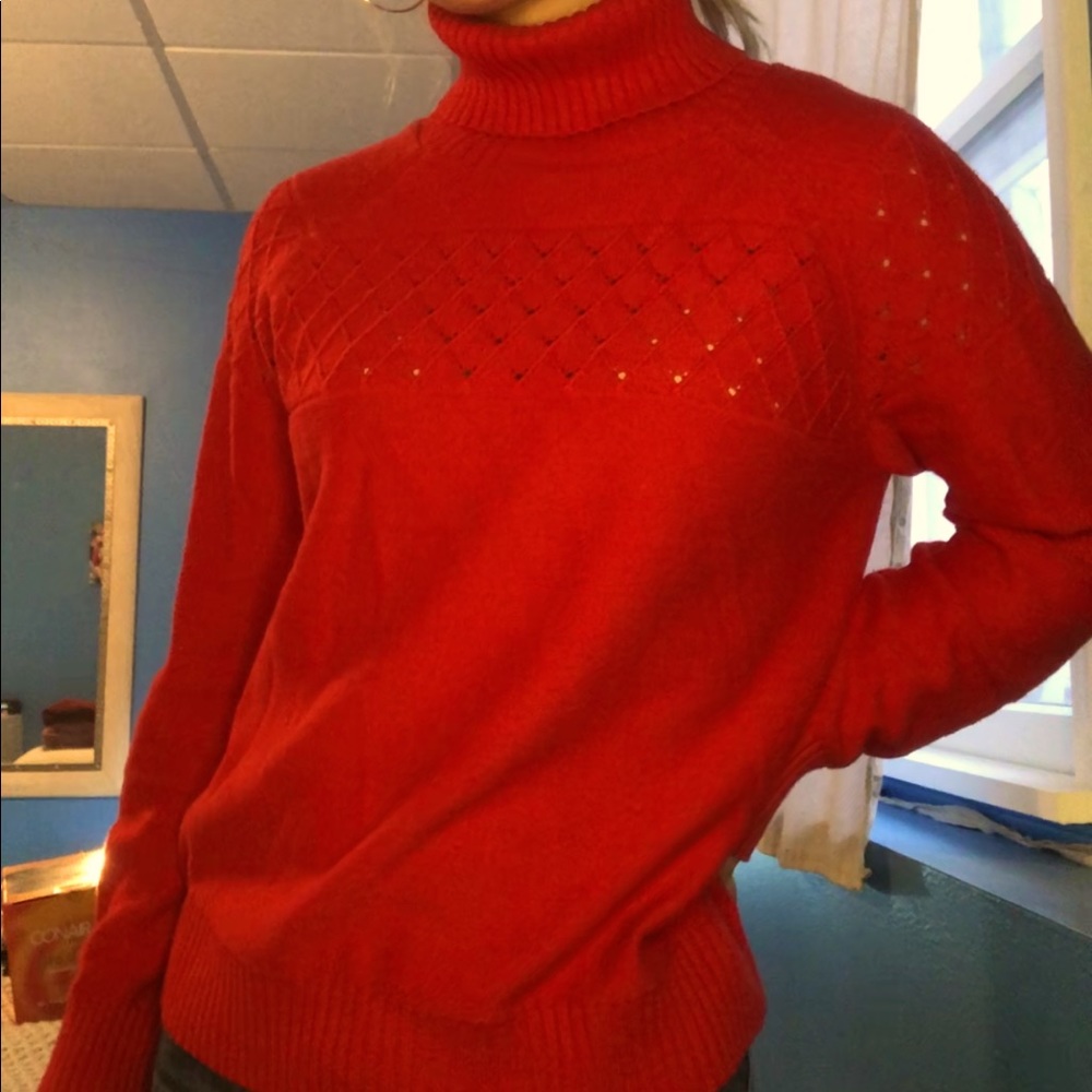 Red turtleneck sweater